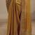 gold solid saree with unstitched blouse piece