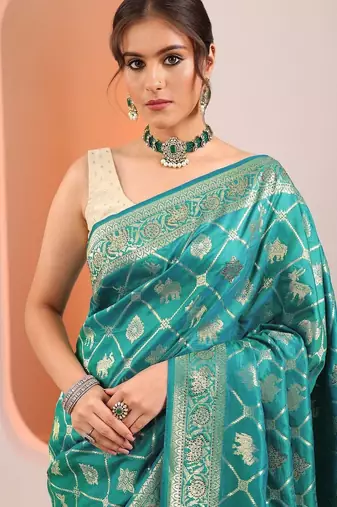 teal woven design sarees with unstitched blouse piece