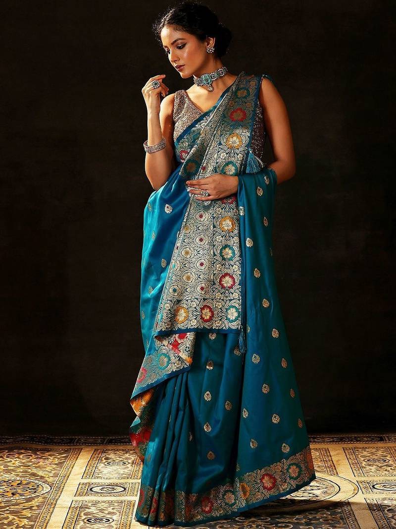 teal woven design saree with unstitched blouse piece
