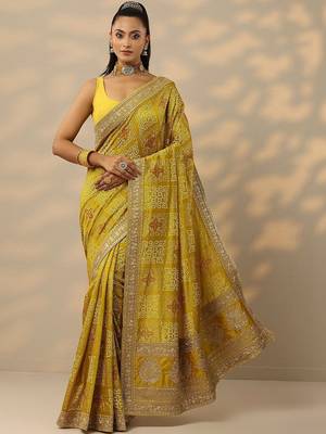 yellow printed banarasi saree with unstitched blouse piece 1