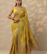 yellow printed banarasi saree with unstitched blouse piece