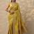 yellow printed banarasi saree with unstitched blouse piece