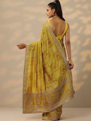 yellow printed banarasi saree with unstitched blouse piece 2