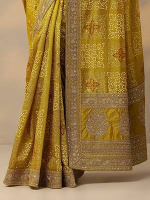 yellow printed banarasi saree with unstitched blouse piece 4