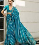 blue printed saree with unstitched blouse piece