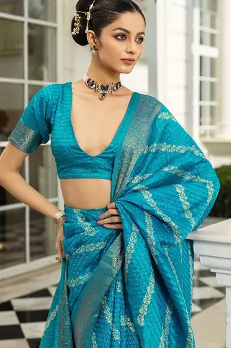 blue printed saree with unstitched blouse piece
