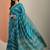 blue printed saree with unstitched blouse piece