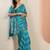 blue printed saree with unstitched blouse piece