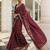 maroon printed saree with unstitched blouse piece