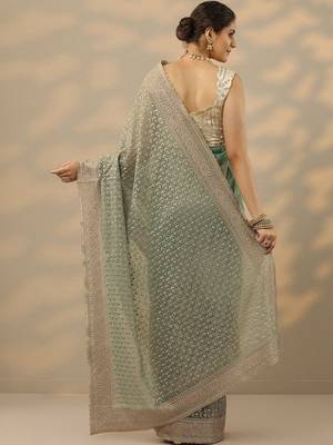 sea green embroidered nylon saree with unstitched blouse piece 2