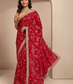 red tribal printed saree with unstitched blouse piece