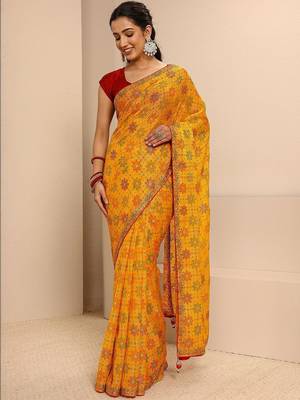 yellow bandhani printed saree with unstitched blouse piece 1