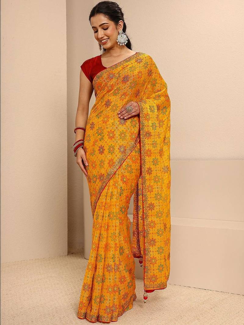 yellow bandhani printed saree with unstitched blouse piece