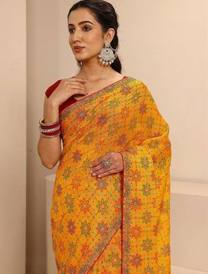 yellow bandhani printed saree with unstitched blouse piece 5