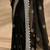 black embellished satin saree with unstitched blouse piece