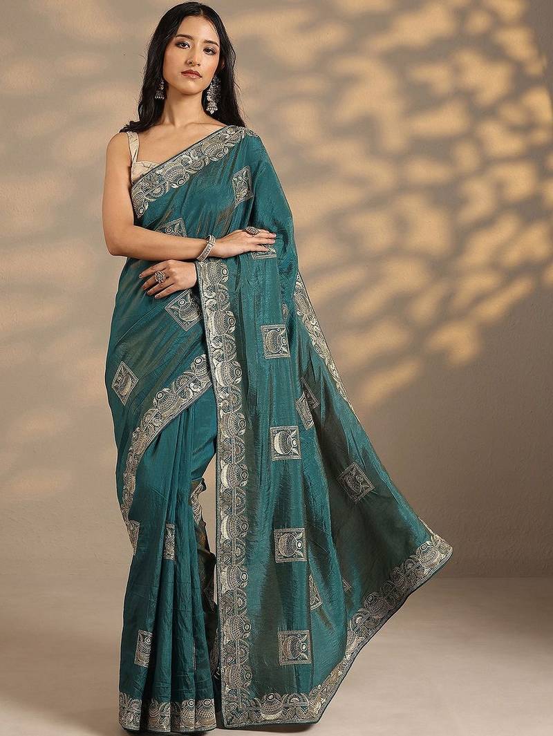teal embellished saree with unstitched blouse piece