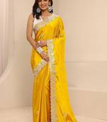 yellow embroidered saree with unstitched blouse piece