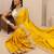 yellow embroidered saree with unstitched blouse piece