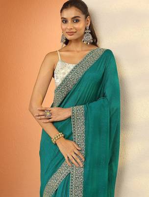 teal ethnic motifs embroidered silk blend heavy work saree 1