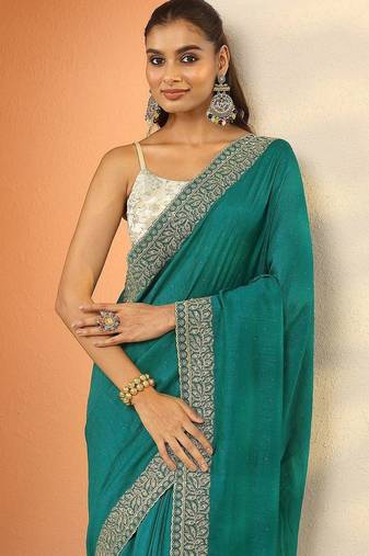 teal ethnic motifs embroidered silk blend heavy work saree