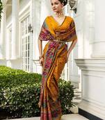 mustard printed crepe saree with unstitched blouse piece