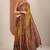 mustard printed crepe saree with unstitched blouse piece