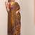 mustard printed crepe saree with unstitched blouse piece