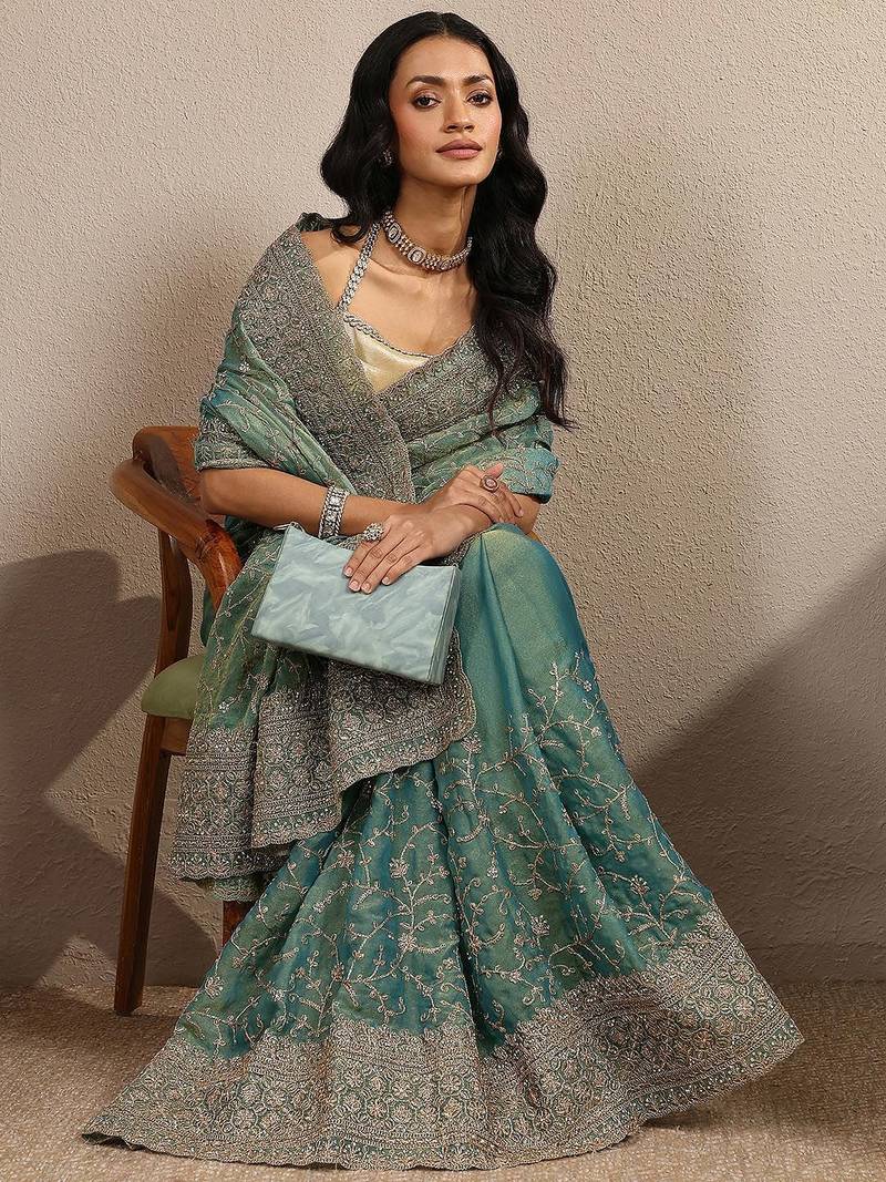 teal embroidered organza saree with unstitched blouse piece