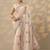 cream embroidered crepe saree with unstitched blouse piece