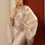 cream embroidered crepe saree with unstitched blouse piece