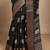black printed georgette saree with unstitched blouse piece