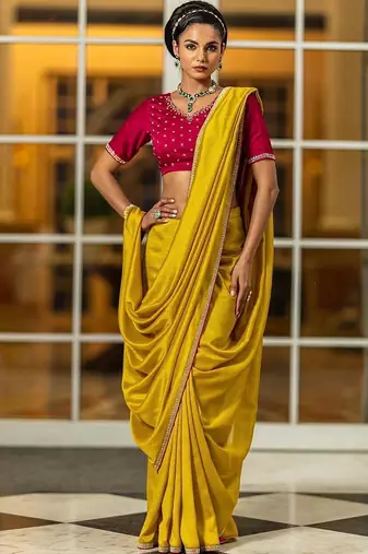 yellow sequinned silk blend saree