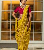 yellow sequinned silk blend saree