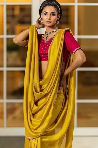 yellow sequinned silk blend saree