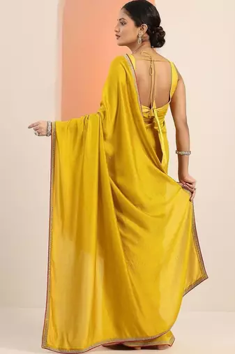 yellow sequinned silk blend saree