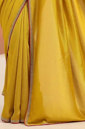 yellow sequinned silk blend saree