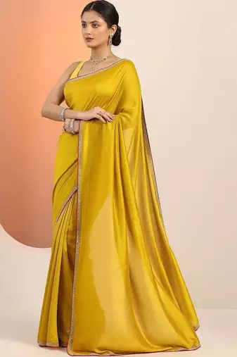 yellow sequinned silk blend saree