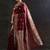 maroon woven design saree with unstitched blouse piece