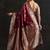 maroon woven design saree with unstitched blouse piece