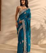 teal floral embellished saree with unstitched blouse piece