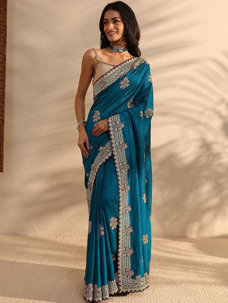 teal floral embellished saree with unstitched blouse piece