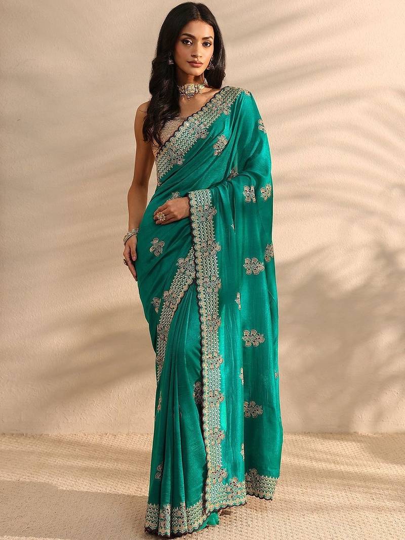 teal embellished saree with unstitched blouse piece