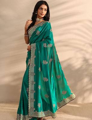 teal embellished saree with unstitched blouse piece 4