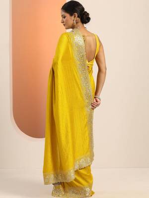 yellow embellished zari silk blend heavy work saree 3