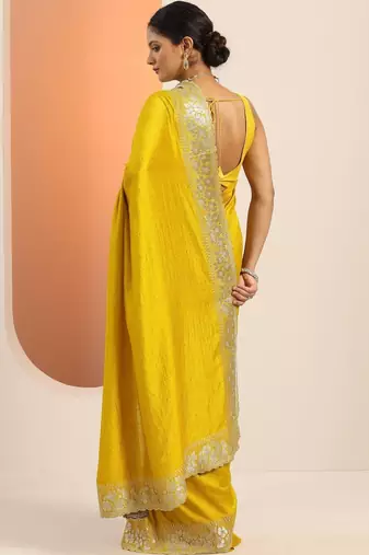 yellow embellished zari silk blend heavy work saree