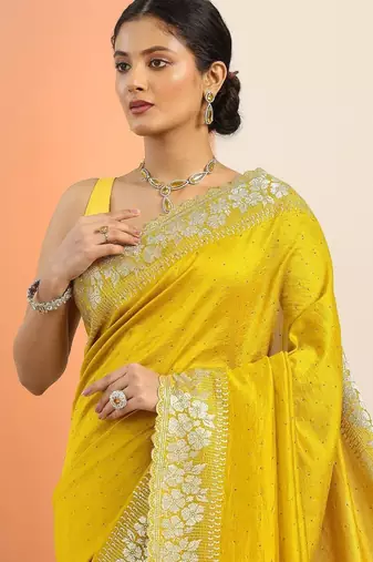 yellow embellished zari silk blend heavy work saree