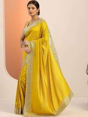 yellow embellished zari silk blend heavy work saree 5