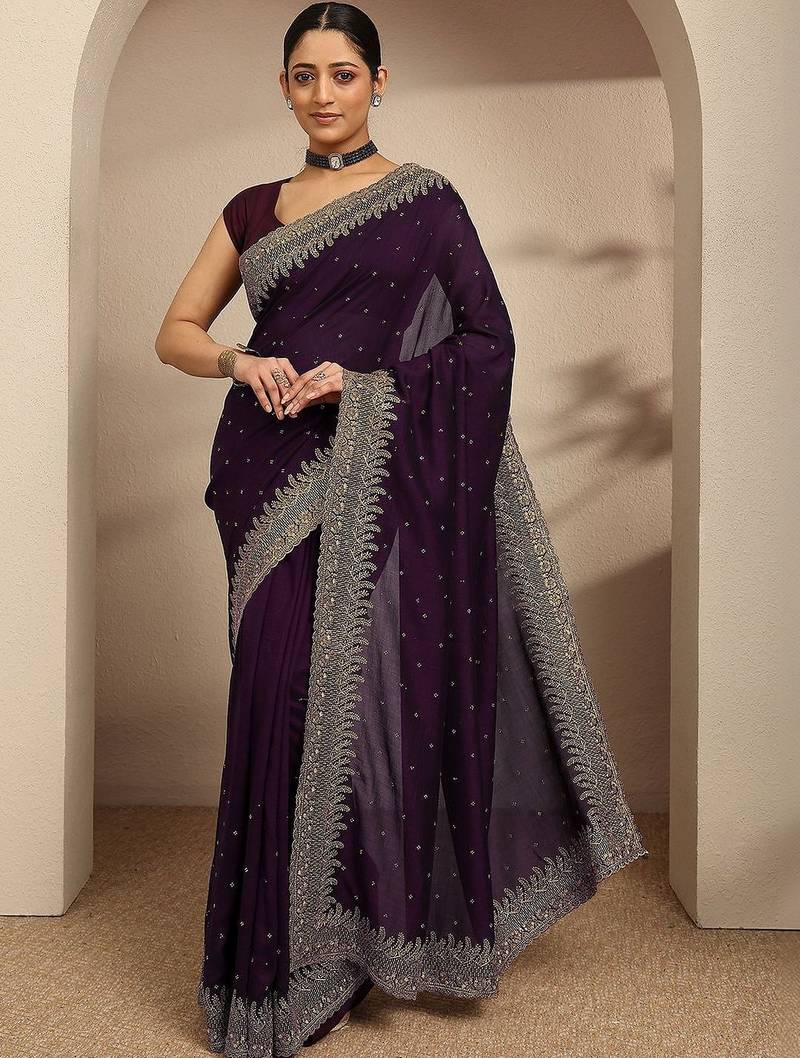 purple beads embellished saree with zari embellished border and a blouse piece