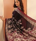 black printed saree with unstitched blouse piece