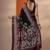 black printed saree with unstitched blouse piece